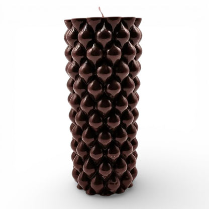 Australian Sandalwood scented soy pillar candle with intricate design, offering a tranquil escape into nature's elegance.
