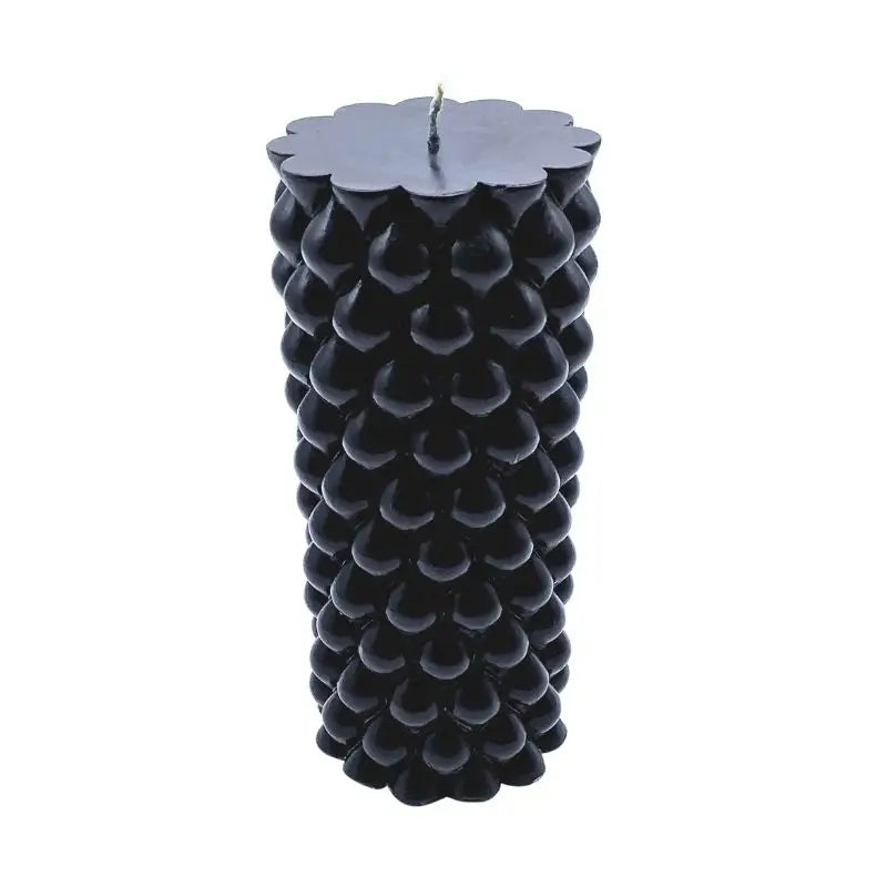 Black Vanilla Scented Soy Pillar Candle featuring an elegant textured design for luxurious home decor and aromatic ambiance.