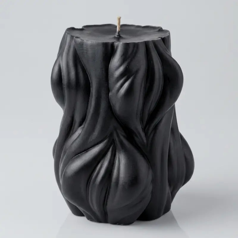 Black Decorative Candle 1.2kg with a unique textured design, ideal for contemporary decor and long-lasting fragrance.