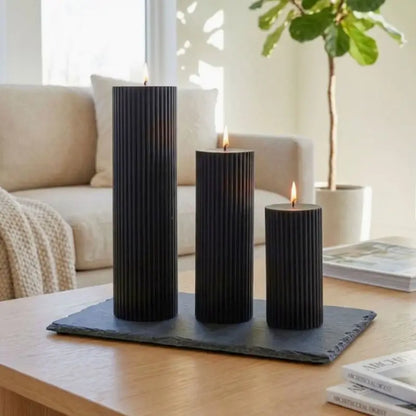 Ribbed Candles - Set of 3 Pillars in black on a slate tray, enhancing home decor with elegant texture.