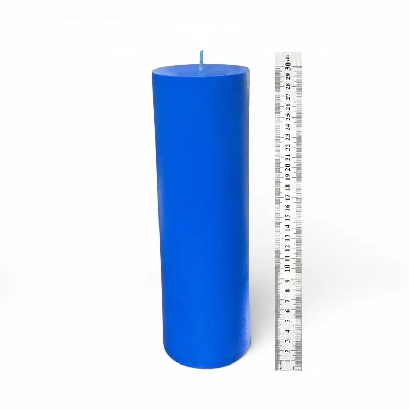 Big Candle in blue color with ruler for size reference, showcasing its impressive height and bold design.