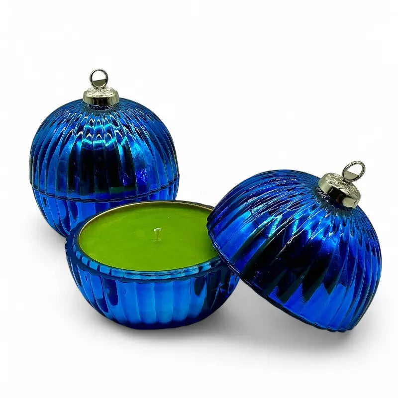 Blue Glass Bauble Christmas Scented Candle with gold top, decorative jar, and festive fragrance for holiday decor.