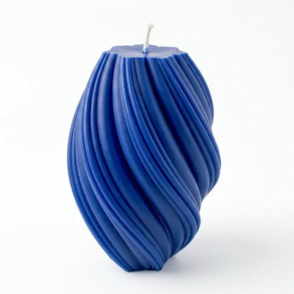Large Pillar Candle in a swirly shape, rich blue color, handcrafted decoration, perfect for home decor.