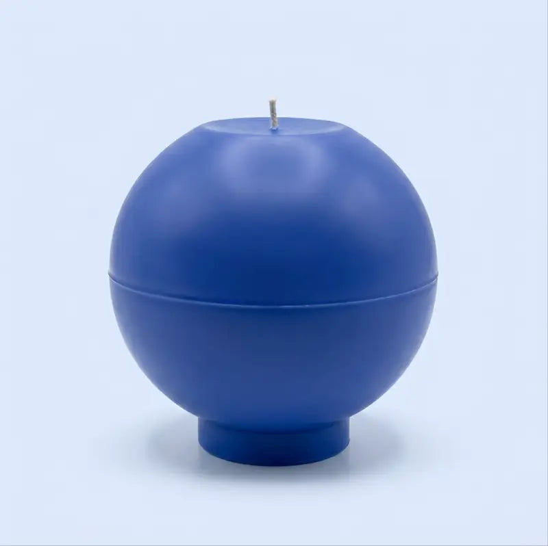 Round Candle - XL 1.65 kg customisable blue sphere candle with a wick on top.