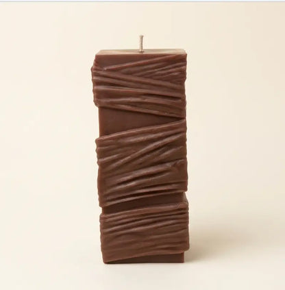 Custom Candle - Large Sculptural Design featuring unique textured brown wax finish.