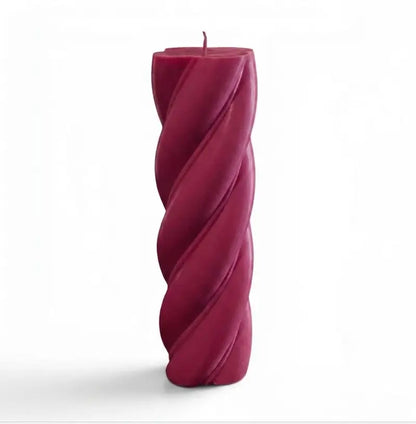 Customisable Candle - Extra Large Column in a striking twist design, featuring a rich burgundy color.
