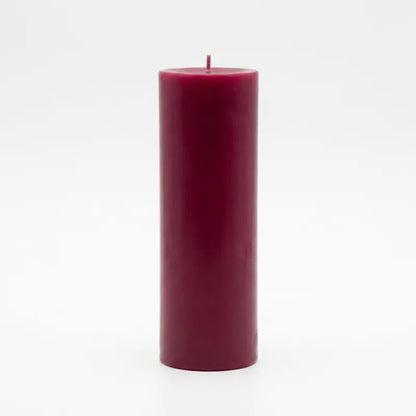 Giant Pillar Candle in a deep red color, standing 27cm tall and 9cm diameter, designed for extended burning.