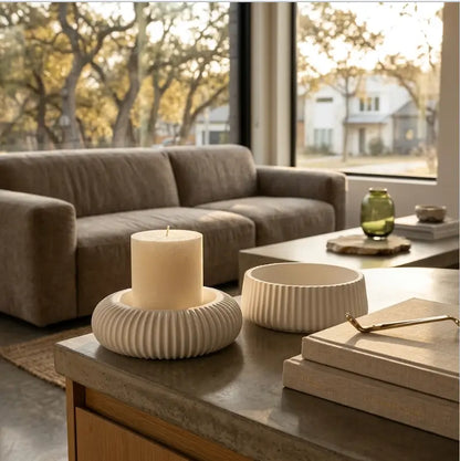 Candle Holder - Decorative Set of 2 featuring a pillar candle on a modern coffee table in a cozy living room.