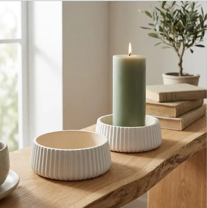 Candle Holder - Decorative Set of 2 featuring a green pillar candle and decorative base.
