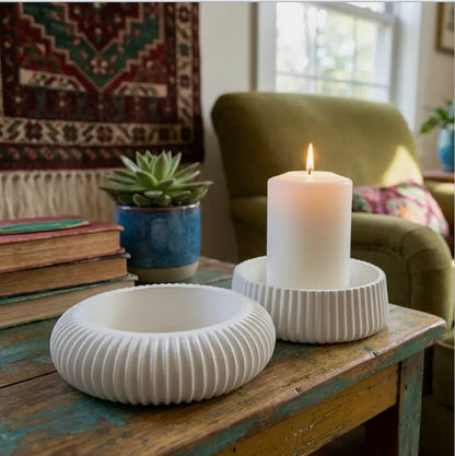 Candle Holder - Decorative Set of 2 featuring white holders with a pillar candle, perfect for adding style and protection to surfaces.