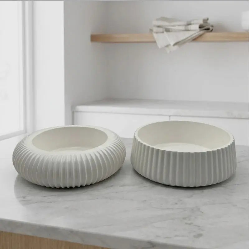 Candle Holder - Decorative Set of 2 showcasing white ceramic holders on a marble surface.