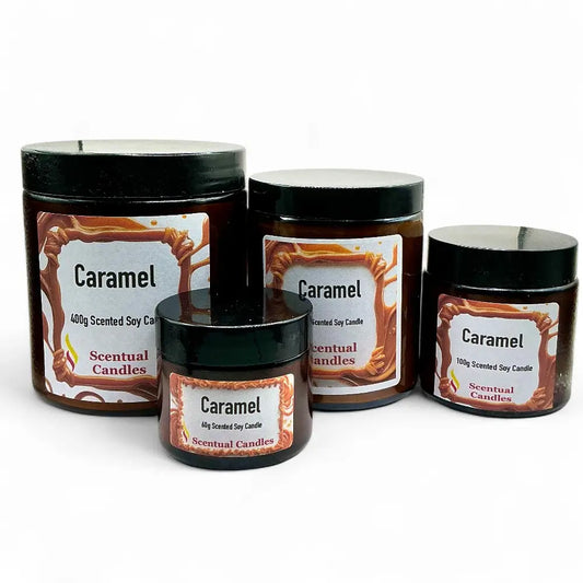 Four caramel-scented candles with labels on a white background