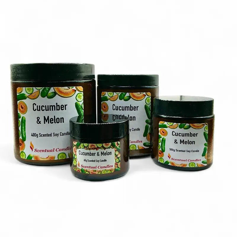 Four jars of 'Cucumber and Melon' scented candles on a white background