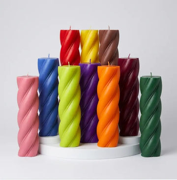 Customisable Candle collection featuring extra large twist column candles in vibrant colors on display.