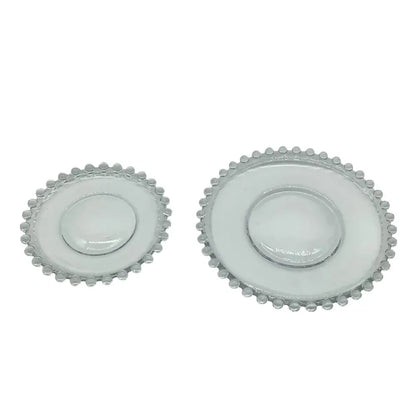 Decorative round glass Candle Plate with beaded edge for elegant candle displays.