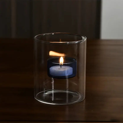 Decorative Glass Tealight Candle Holder in the dark with lit candle