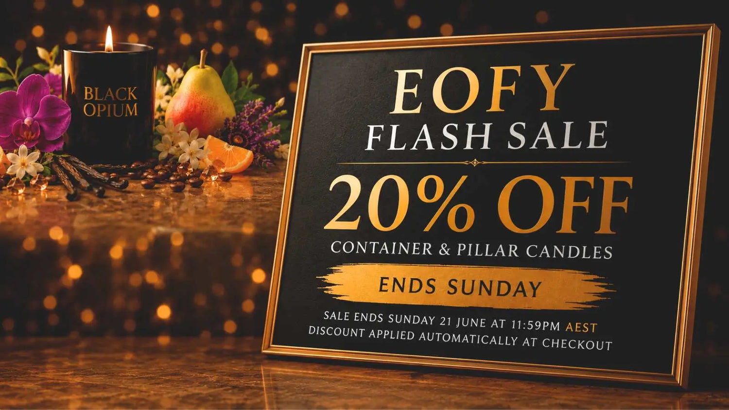 Flash sale sign for candles with a candle and flowers in the background