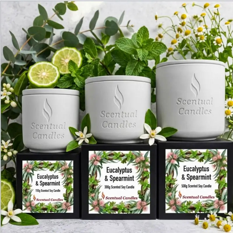 Eucalyptus Candle with Spearmint products displayed in elegant jars and packaging with fresh greenery.