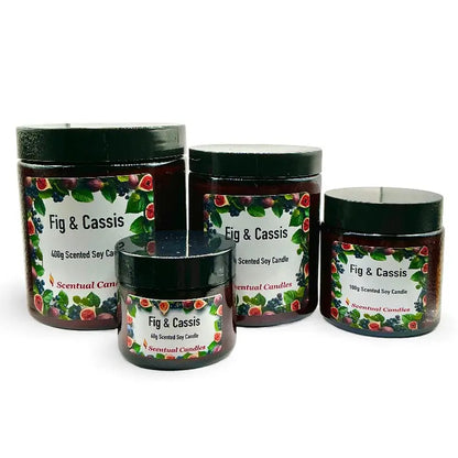 Assorted sizes of Fig and Cassis scented soy candles with colorful labels.