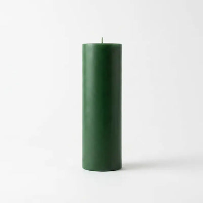 Giant Pillar Candle in green color, 27cm tall and 9cm in diameter for impactful decor.