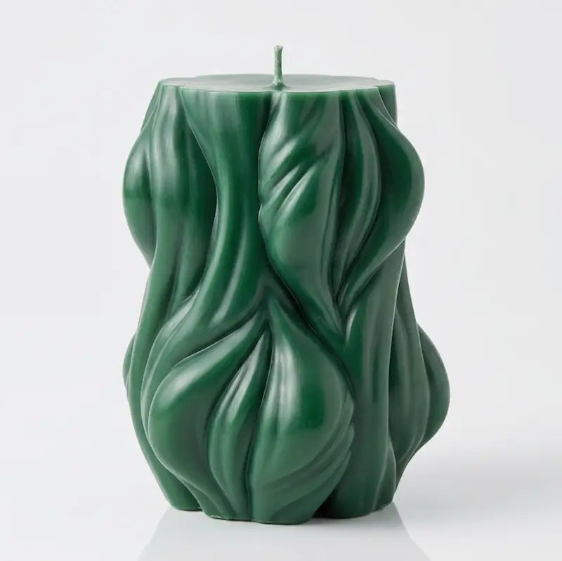 Decorative Candle in green color with a unique textured design, ideal for home decor and enhancing ambiance.