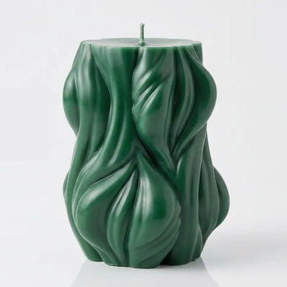 Decorative Candle in green color with a unique textured design, ideal for home decor and enhancing ambiance.