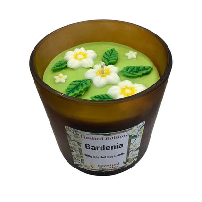 Scented candles with gardenia design on a white background