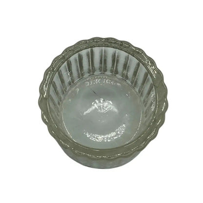 Clear glass candle holder on a white background