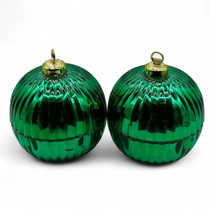 Glass Bauble Christmas Scented Candles in green ornaments with gold tops, perfect holiday keepsake.