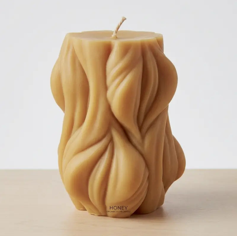 Decorative Candle 1.2kg in honey color with unique texture, perfect for adding style and fragrance to any room.