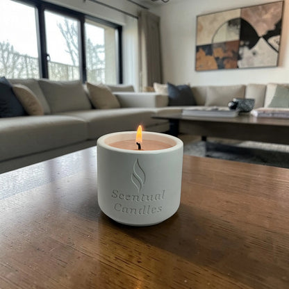 Housewarming Candle Gift creating a cozy ambiance in a stylish living room