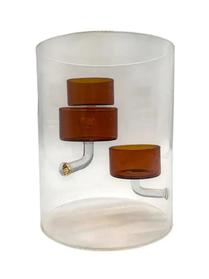 Decorative wall light fixture with brown cylindrical components inside a clear glass enclosure on a white background