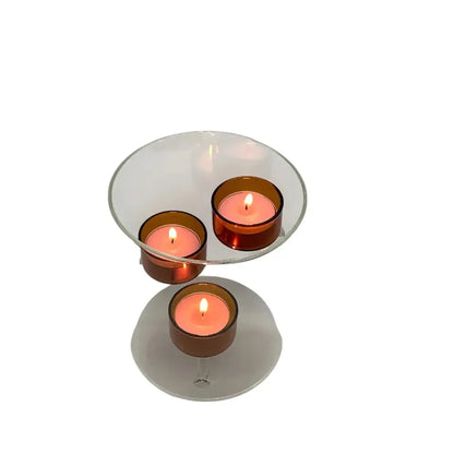 Candle holder with three candles on a white background