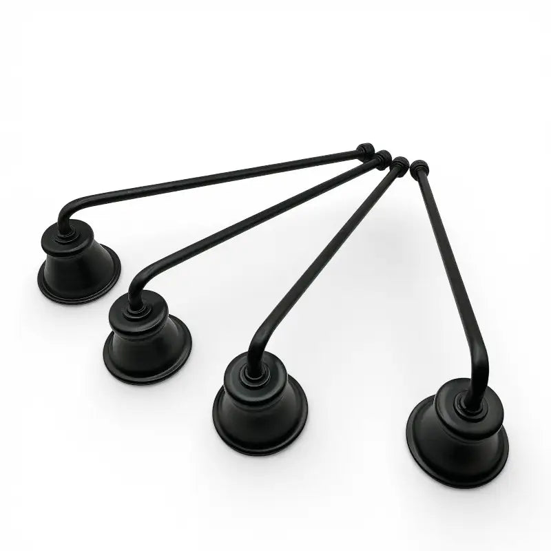 Sleek matte black wrought iron candle snuffer for smoke-free extinguishing, reducing wax splatter and soot. Candle Snuffer tool.