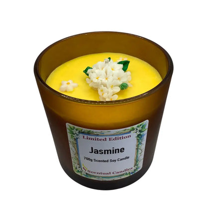 Scented candles labeled 'Jasmine' with a decorative flower on top, on a white background.