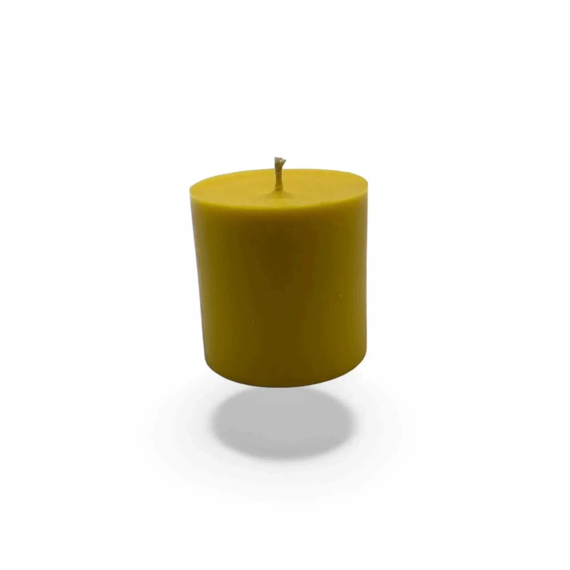 Jasmine scented soy pillar candles in yellow, offering floral and spicy aroma with a smooth finish.