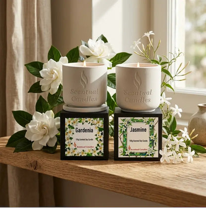 Jasmine Gardenia Candle Set with creamy Gardenia and sweet Jasmine candles on a wooden table, surrounded by white floral decor.