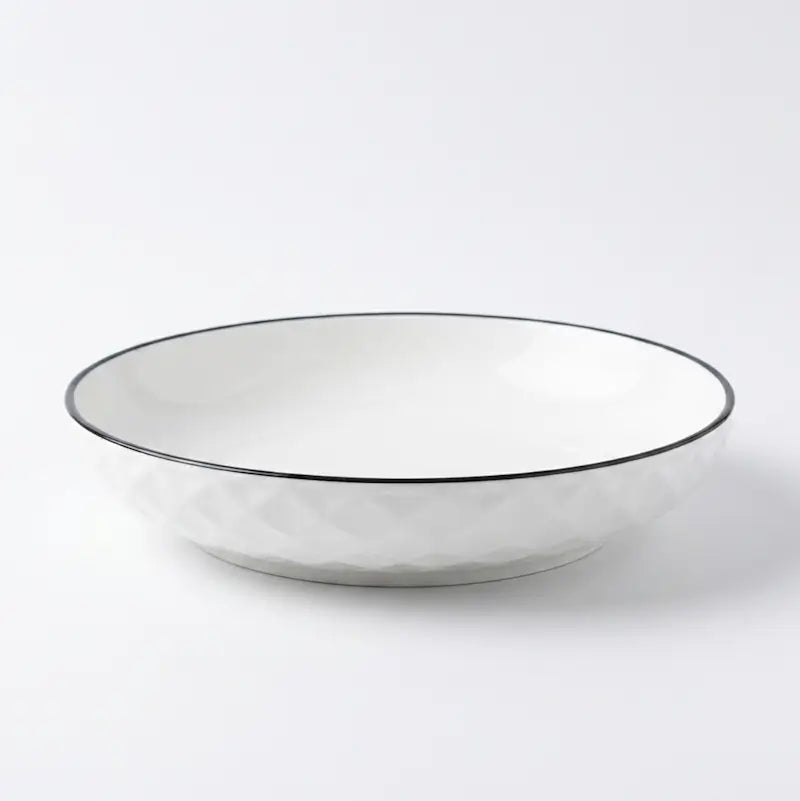 Large Ceramic Candle Plate in white with diamond hexagon pattern and black rim.