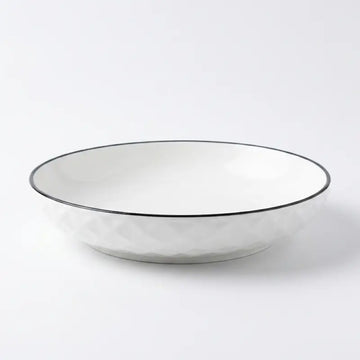 Large Ceramic Candle Plate in white with diamond hexagon pattern and black rim.