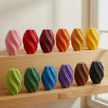 Colorful Large Pillar Candle Swirly Shape collection displayed on a shelf, showcasing premium handcrafted design.