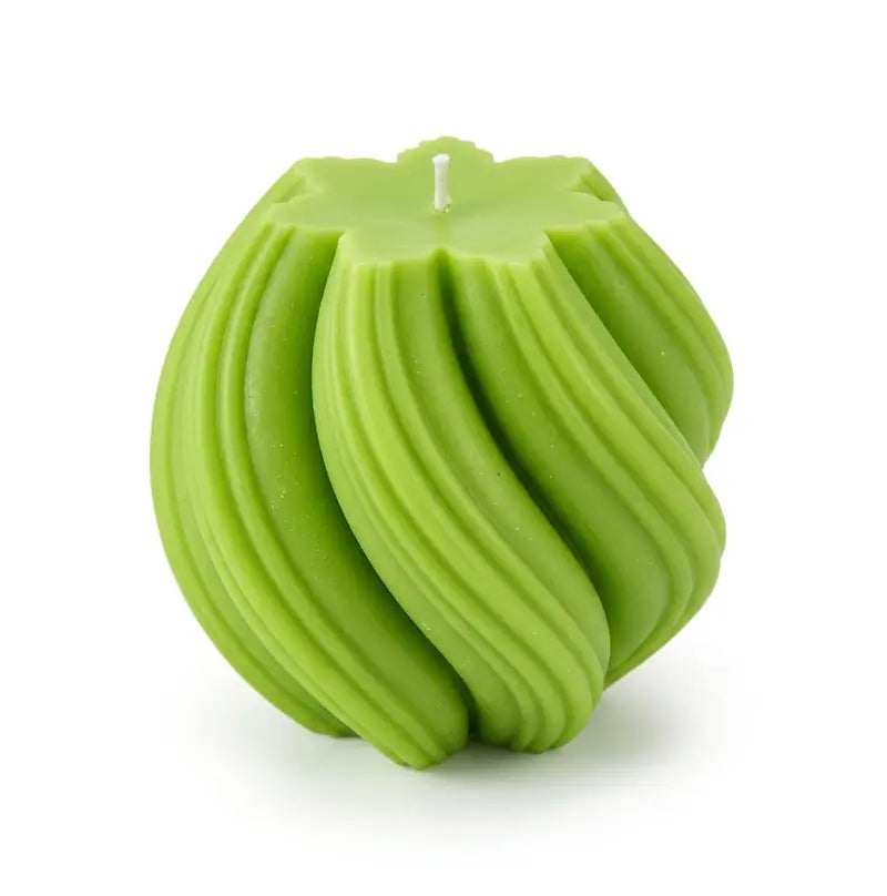 Extra large Ball Candle in vibrant green, handcrafted with a unique sculptural design and a decorative spiral pattern.
