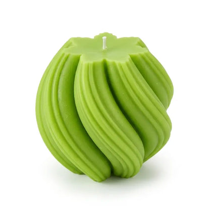 Extra large Ball Candle in vibrant green, handcrafted with a unique sculptural design and a decorative spiral pattern.