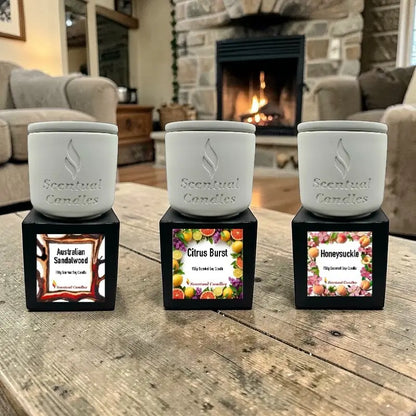 Living Room Scented Candles Set displayed on a wooden table, featuring Australian Sandalwood, Citrus Burst, and Honeysuckle scents.
