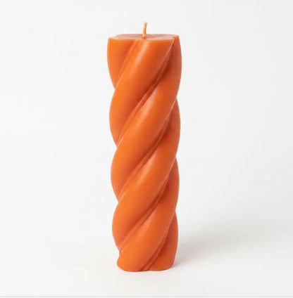 Customisable Candle in orange color, extra large twist column design for home decor and personal style.