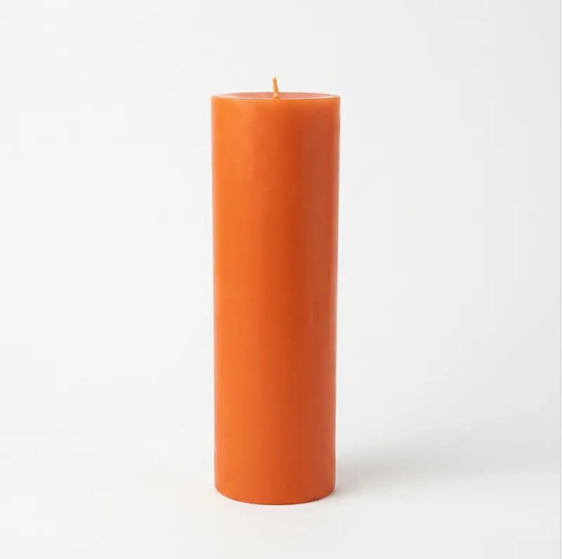 Giant Pillar Candle in vibrant orange, customizable, 27cm tall and 9cm in diameter, designed for long-lasting use.