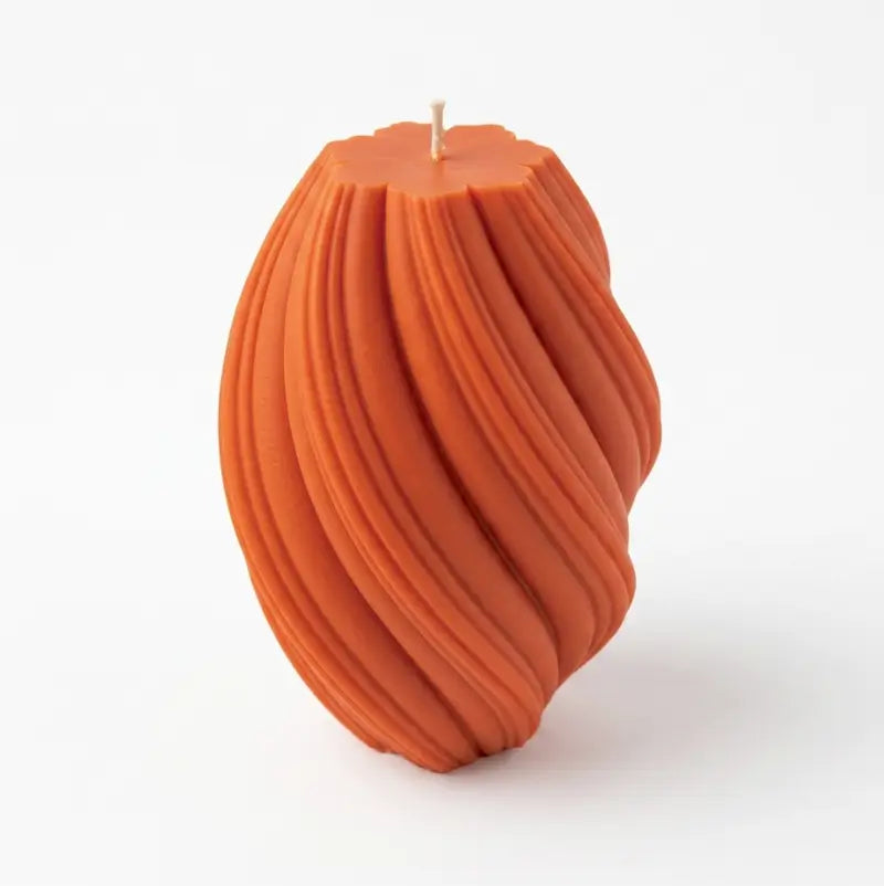Large Pillar Candle in a swirly orange shape, handcrafted for unique decor and long-lasting fragrance.