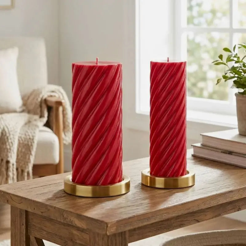 Pillar Candle Set featuring two spiral columns in red on a wooden table, ideal for home decor.