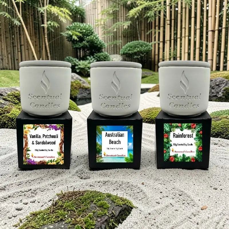 Relax Candle Pack featuring Vanilla Patchouli, Australian Beach, and Rainforest candles in a serene garden setting.
