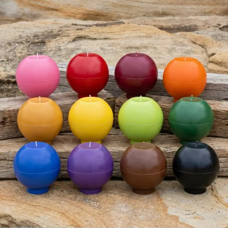 Round Candle in various customizable colors displayed on wooden background.