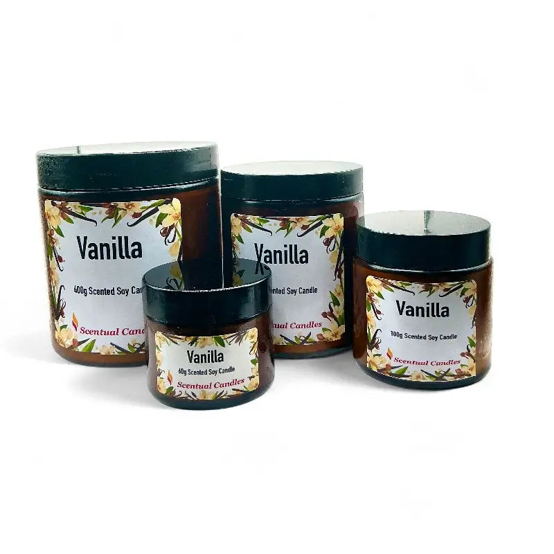 Four vanilla scented candle of different sizes on a white background